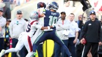 Seattle Seahawks wide receiver Cooper Kupp (10) makes a catch against New England Patriots cornerback Marcus Jones (25) during the first quarter in Super Bowl LX at Levi's Stadium.