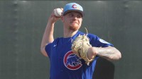 Chicago Cubs pitcher Cade Horton (22) throws in the bullpen during spring training camp at Sloan Park.