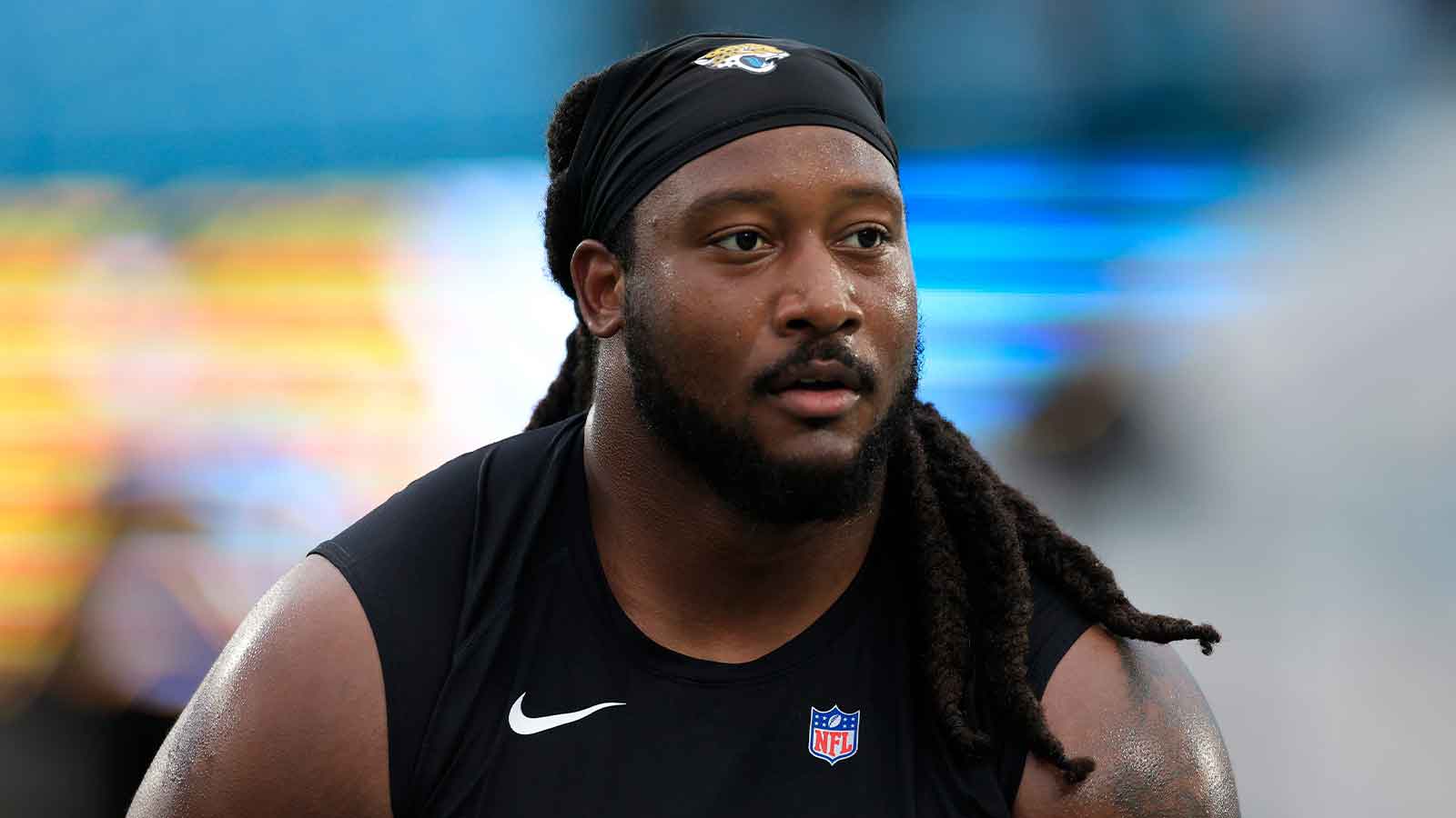 Jacksonville Jaguars defensive tackle Davon Hamilton (52) warms up before an NFL football matchup at EverBank Stadium, Sunday, Jan. 4, 2026, in Jacksonville, Fla.