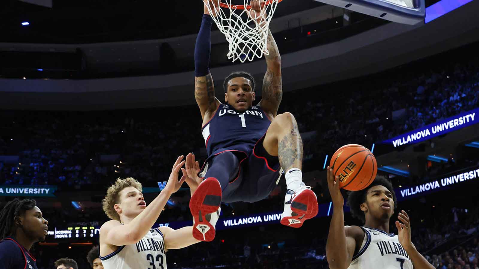 UConn Huskies guard Solo Ball (1) dunks the ball against the Villanova Wildcats during the first half at Xfinity Mobile Arena.