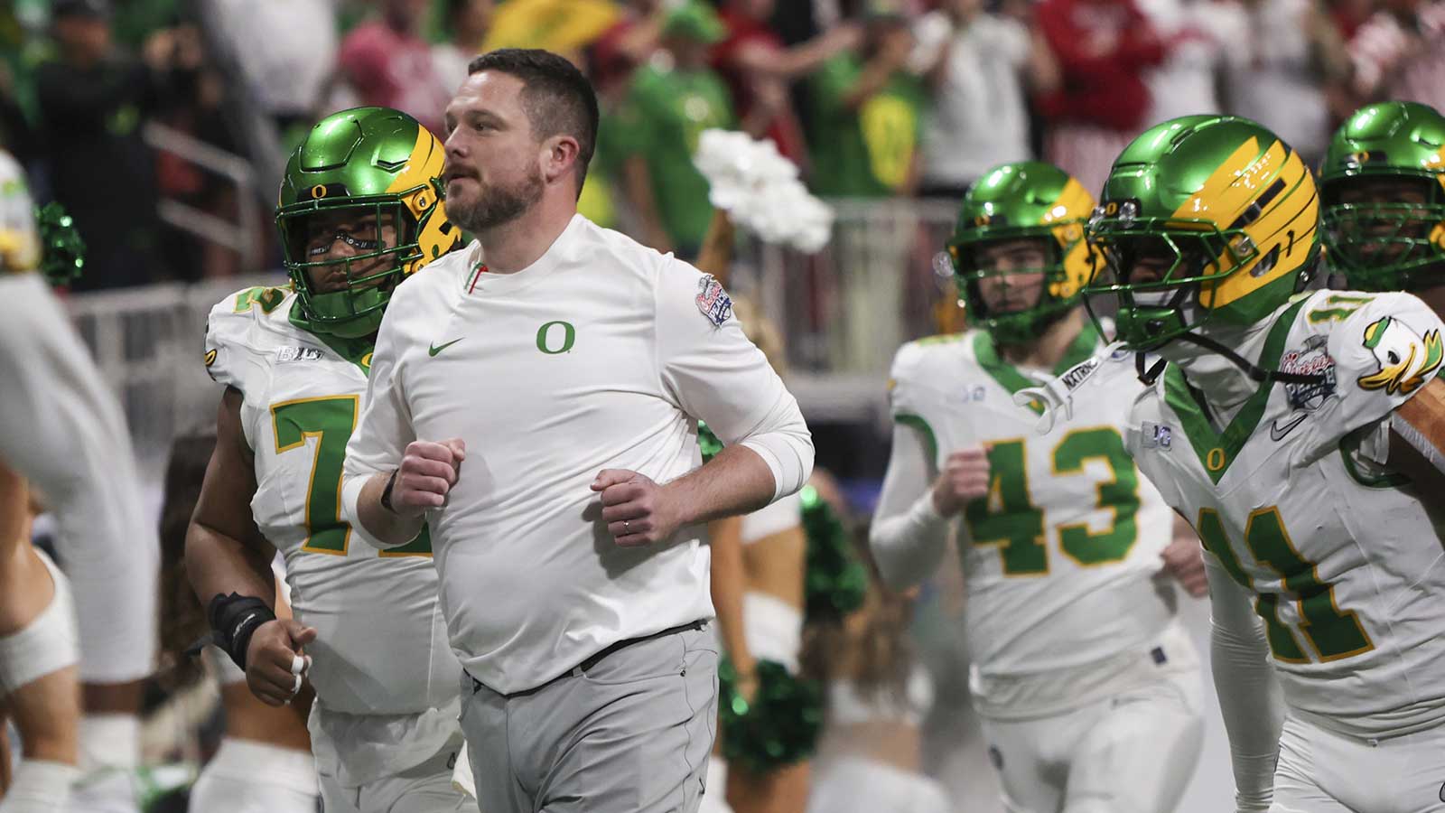 Oregon Ducks head coach Dan Lanning leads his team onto the field prior to the 2025 Peach Bowl and semifinal game of the College Football Playoff against the Indiana Hoosiers at Mercedes-Benz Stadium.