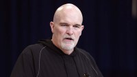 Washington Commanders coach Dan Quinn speaks at the NFL Scouting Combine at the Indiana Convention Center.