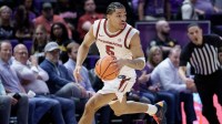 Arkansas Razorbacks guard Darius Acuff Jr. (5) dribbles against the Alabama Crimson Tide during the second half at Pete Maravich Assembly Center.