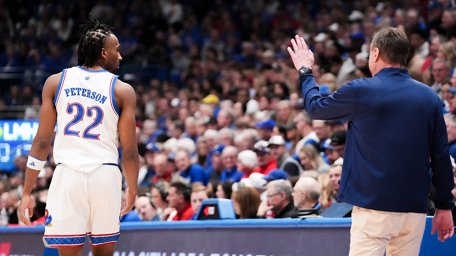 Kansas Jayhawks head coach Bill Self gestures to guard Darryn Peterson (22) against the Cincinnati Bearcats during the second half of the game at Allen Fieldhouse.