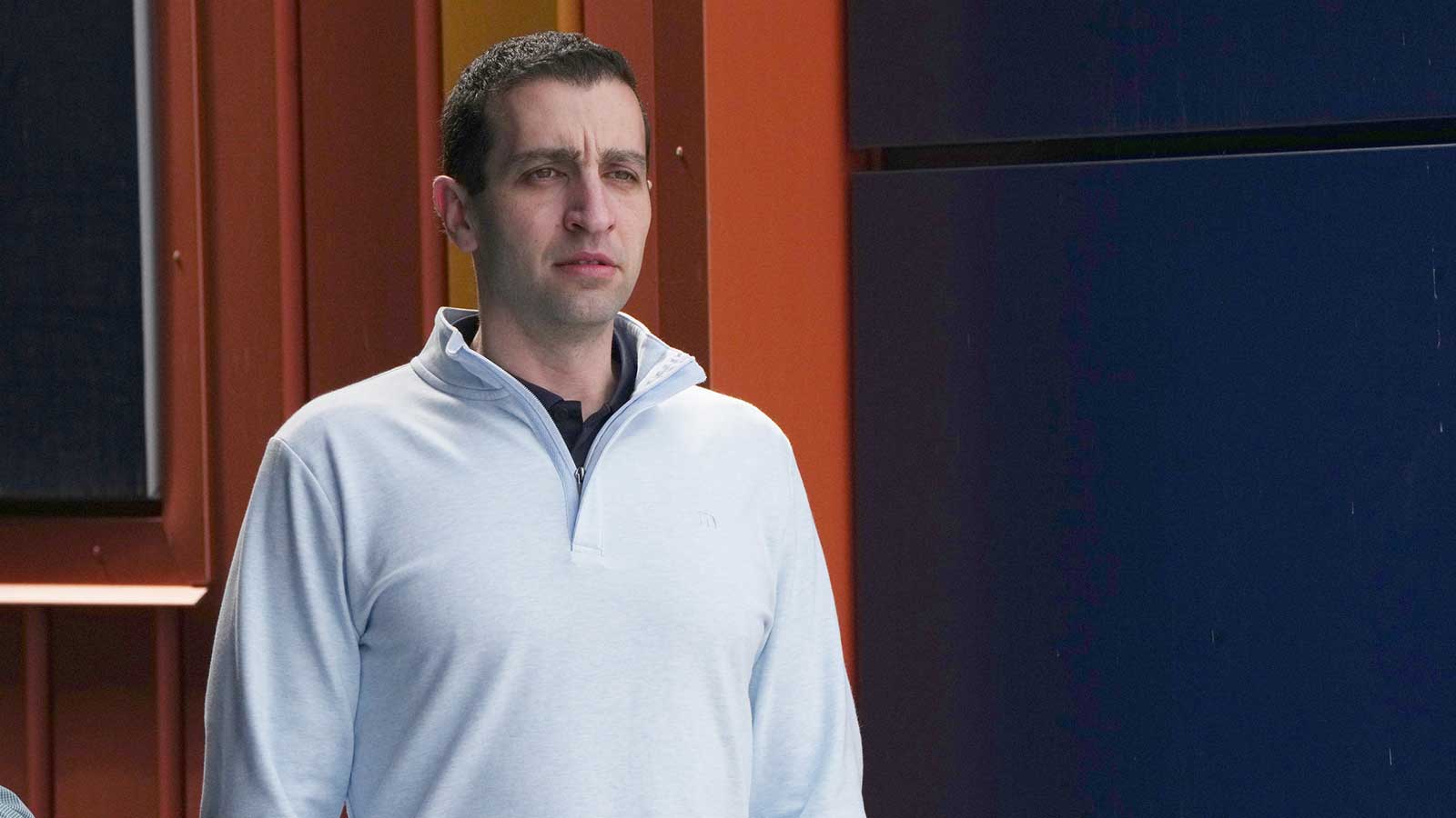 David Stearns, Mets President of Baseball Operations, watches pitchers warm-up during spring training.