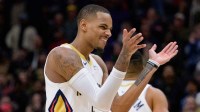 New Orleans Pelicans guard Dejounte Murray (5) claps later in the fourth quarter against the Dallas Mavericks at Smoothie King Center.