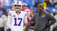 Buffalo Bills quarterback Josh Allen (17) talks with quarterback coach Ronald Curry prior to the game against the Tampa Bay Buccaneers at Highmark Stadium. Mandatory Credit: Gregory Fisher-Imagn Images