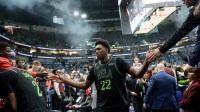 New Orleans Pelicans center Derik Queen (22) greets fans after a game against the Memphis Grizzlies at Smoothie King Center.