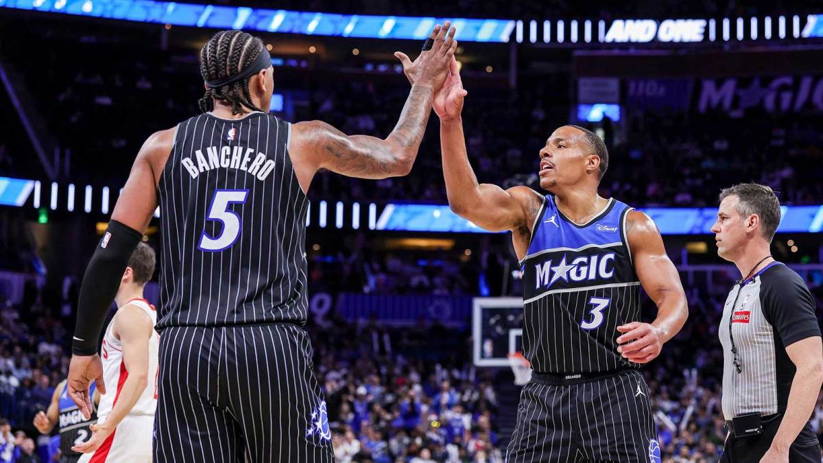Orlando Magic guard Desmond Bane (3) and forward Paolo Banchero (5) celebrate during the second quarter against the Houston Rockets at Kia Center.