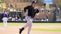 Arizona Diamondbacks' Nolan Arenado (28) rounds the bases after hitting a home run off Colorado Rockies pitcher Antonio Senzatela (49) in the second inning during a spring training game at Salt River Fields.