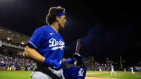 Los Angeles Dodgers catcher Diego Cartaya against the Kansas City Royals during a spring training game at Surprise Stadium.
