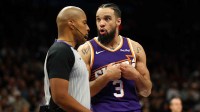 Phoenix Suns forward Dillon Brooks (3) talks to a referee against the Brooklyn Nets in the second half at Mortgage Matchup Center.