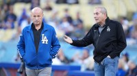 Los Angeles Dodgers president Stan Kasten (left) and executive vice president Lon Rosen before a game against the Miami Marlins at Dodger Stadium.