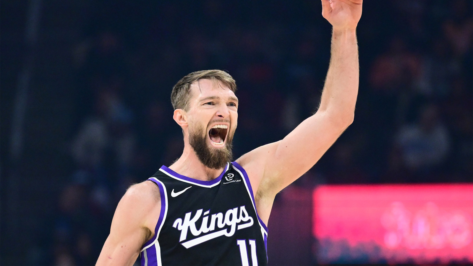 Sacramento Kings forward Domantas Sabonis (11) celebrates after hitting a three-pointer against the Cleveland Cavaliers during the first half at Rocket Arena. 