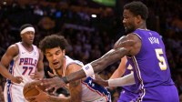 Philadelphia 76ers forward Dominick Barlow (25) is defended by Los Angeles Lakers center Deandre Ayton (5) in the first half at Crypto.com Arena.