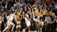 UCLA guard Donovan Dent (2) reacts after scoring the winning basket at the buzzer in overtime against the Illinois Fighting Illini at Pauley Pavilion presented by Wescom Financial.