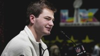 New England Patriots quarterback Drake Maye (10) speaks to media during Opening Night for Super Bowl LX at San Jose Convention Center. Mandatory Credit: Kyle Terada-Imagn Images