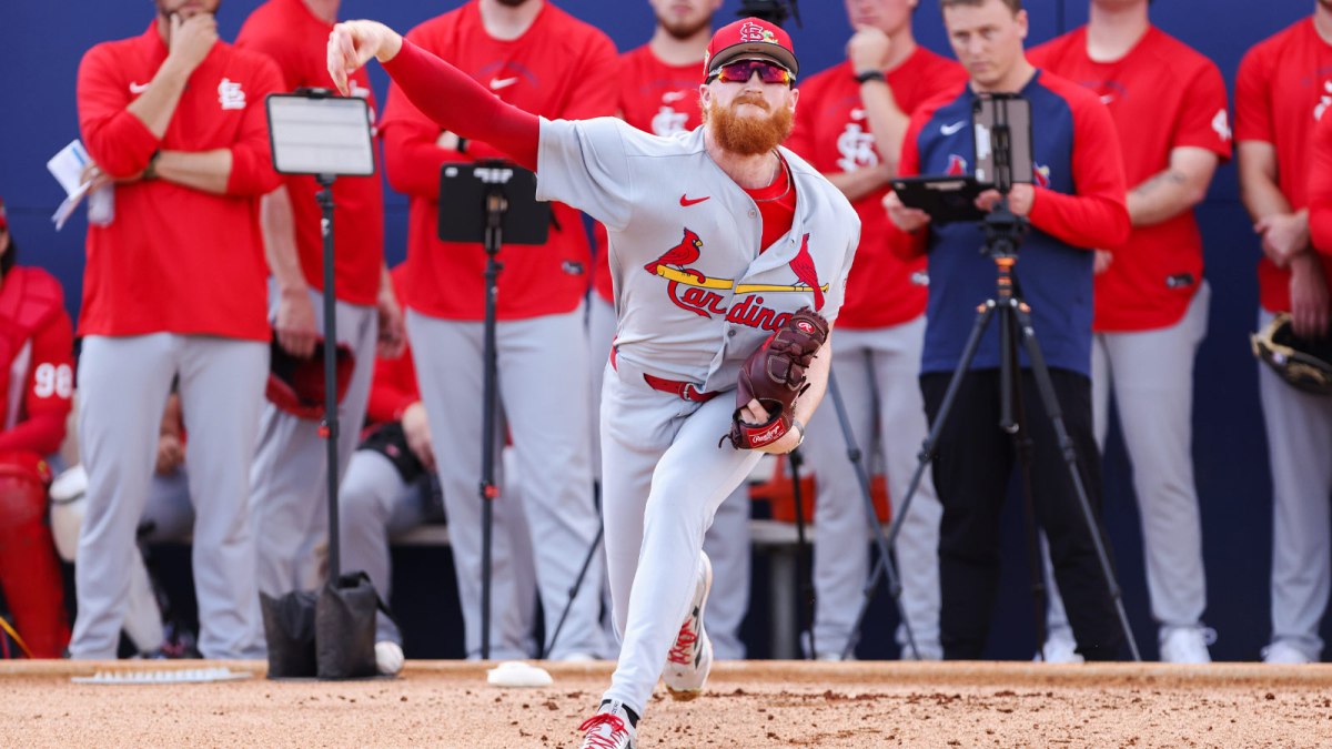 St. Louis Cardinals starting pitcher Dustin May (3) pitches during spring training at Roger Dean Chevrolet Stadium.