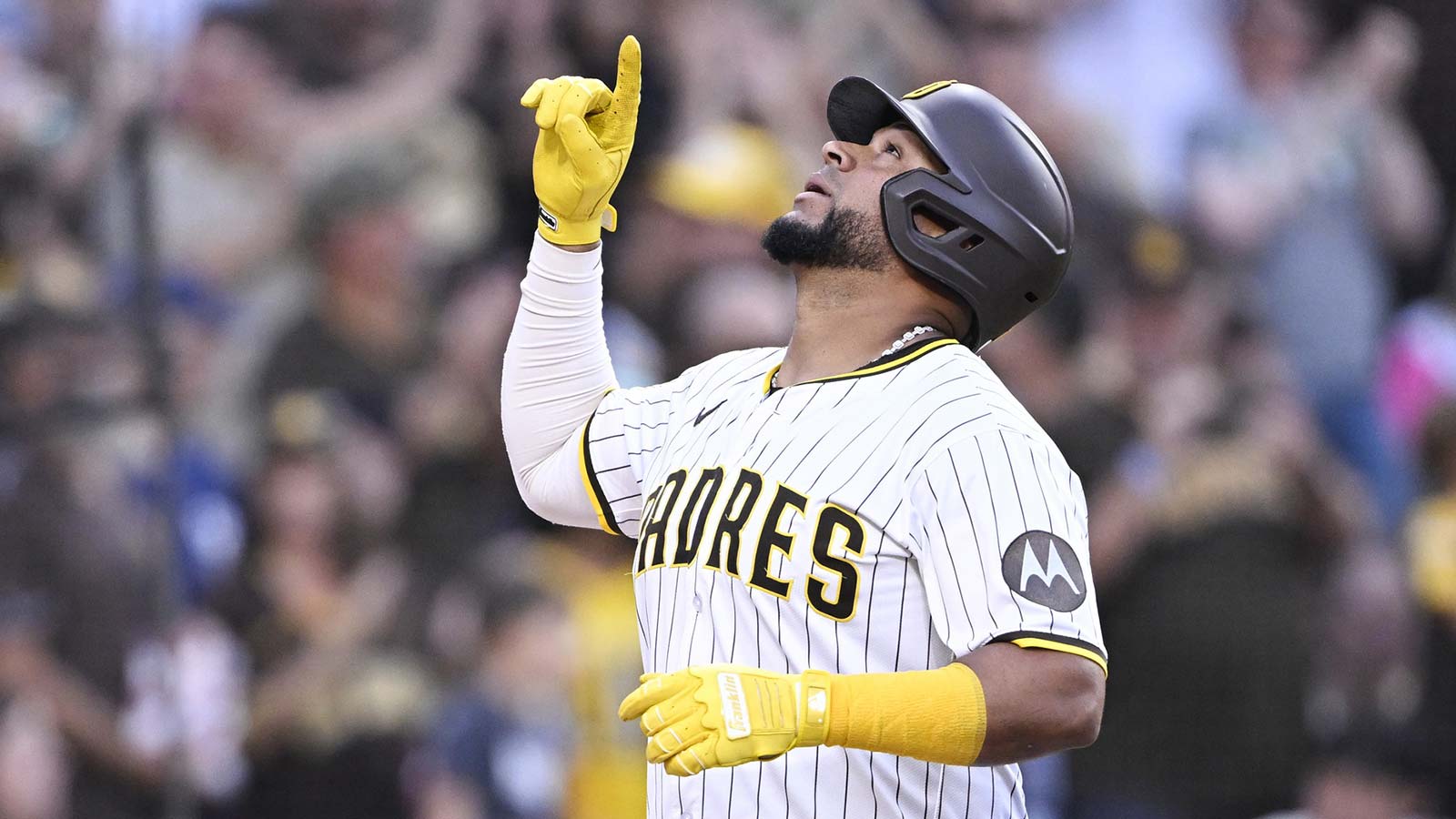 San Diego Padres catcher Elias Diaz (17) points skyward after hitting a solo home run during the second inning against the Arizona Diamondbacks at Petco Park. 