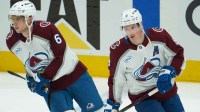 Colorado Avalanche defenseman Erik Johnson (6) and defenseman Cale Makar (8) warm-up prior to game one of the first round of the 2025 Stanley Cup Playoffs against the Dallas Stars at American Airlines Center.