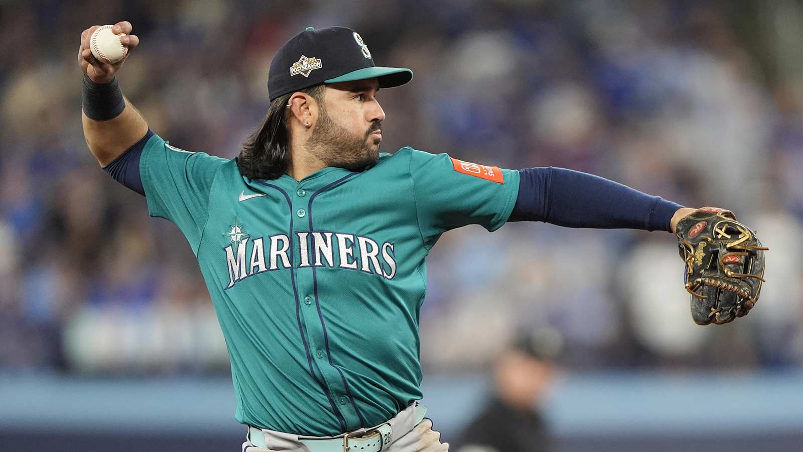 Seattle Mariners third baseman Eugenio Suarez (28) throws to first for an out against Toronto Blue Jays right fielder George Springer (not pictured) in the sixth inning during game six of the ALCS round for the 2025 MLB playoffs at Rogers Centre