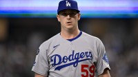 Los Angeles Dodgers relief pitcher Evan Phillips (59) comes off the field during the game between the Texas Rangers and the Los Angeles Dodgers at Globe Life Field.