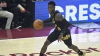 Cleveland Cavaliers guard Dennis Schroder (8) brings the ball up court in the first quarter against the Washington Wizards at Rocket Arena.