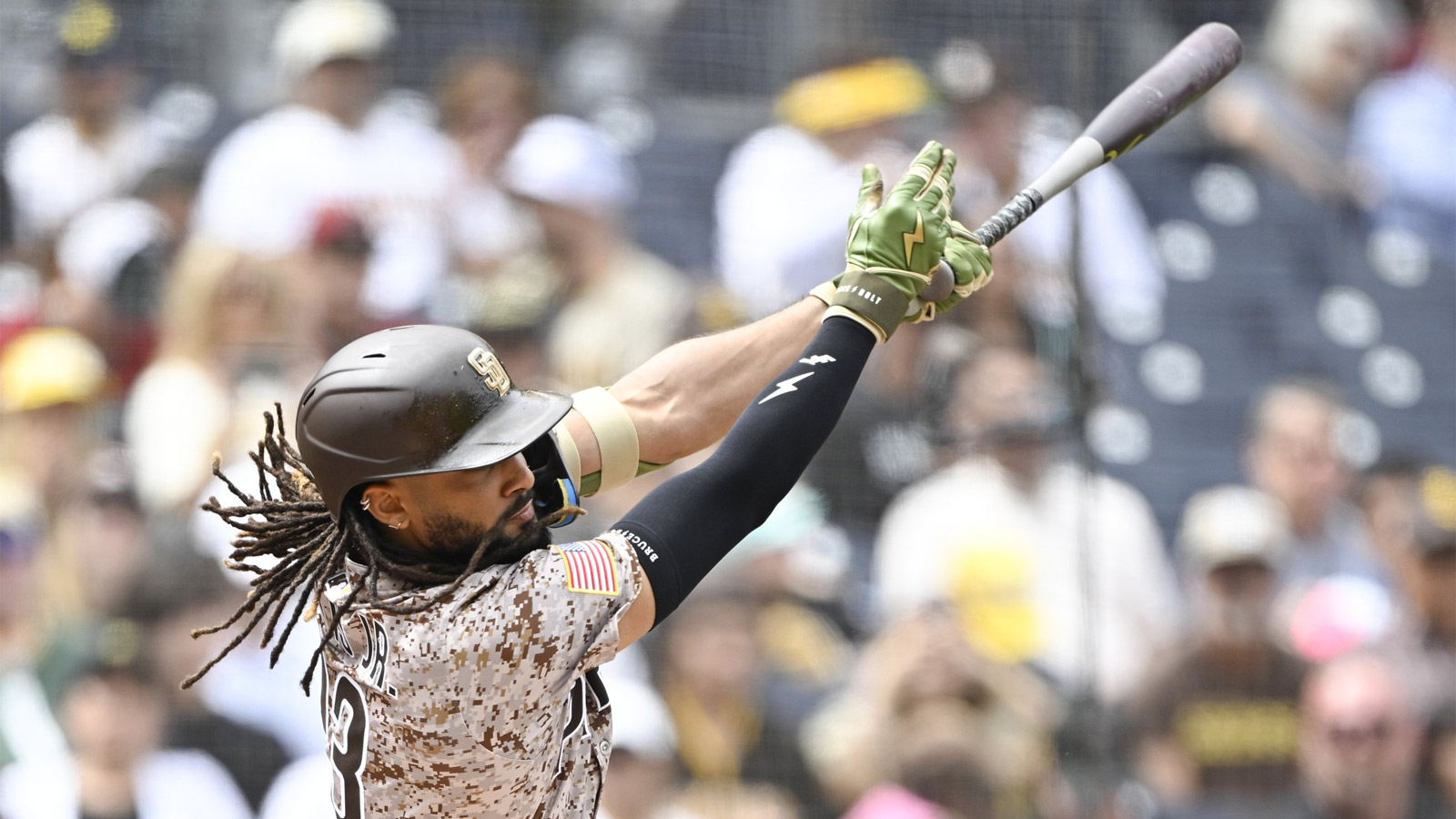 San Diego Padres right fielder Fernando Tatis Jr. (23) hits an RBI single during the first inning against the Arizona Diamondbacks at Petco Park. 