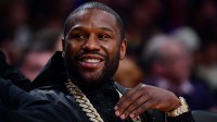 American boxer Floyd Mayweather attends the game between the Los Angeles Lakers and the Oklahoma City Thunder in the first half at Crypto.com Arena.