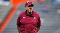 Florida State offensive coordinator Gus Malzahn looks on before a game against the Florida Gators at Ben Hill Griffin Stadium.
