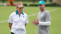 Miami Dolphins team owner Stephen Ross and head coach Adam Gase watch Dolphins organized team activities in Davie, Florida on June 9, 2016. Dolphins Owner Stephen M Ross 59