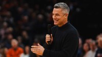 Virginia Cavaliers retired head coach Tony Bennett speaks during a court dedication before the game against the Miami (FL) Hurricanes at John Paul Jones Arena.