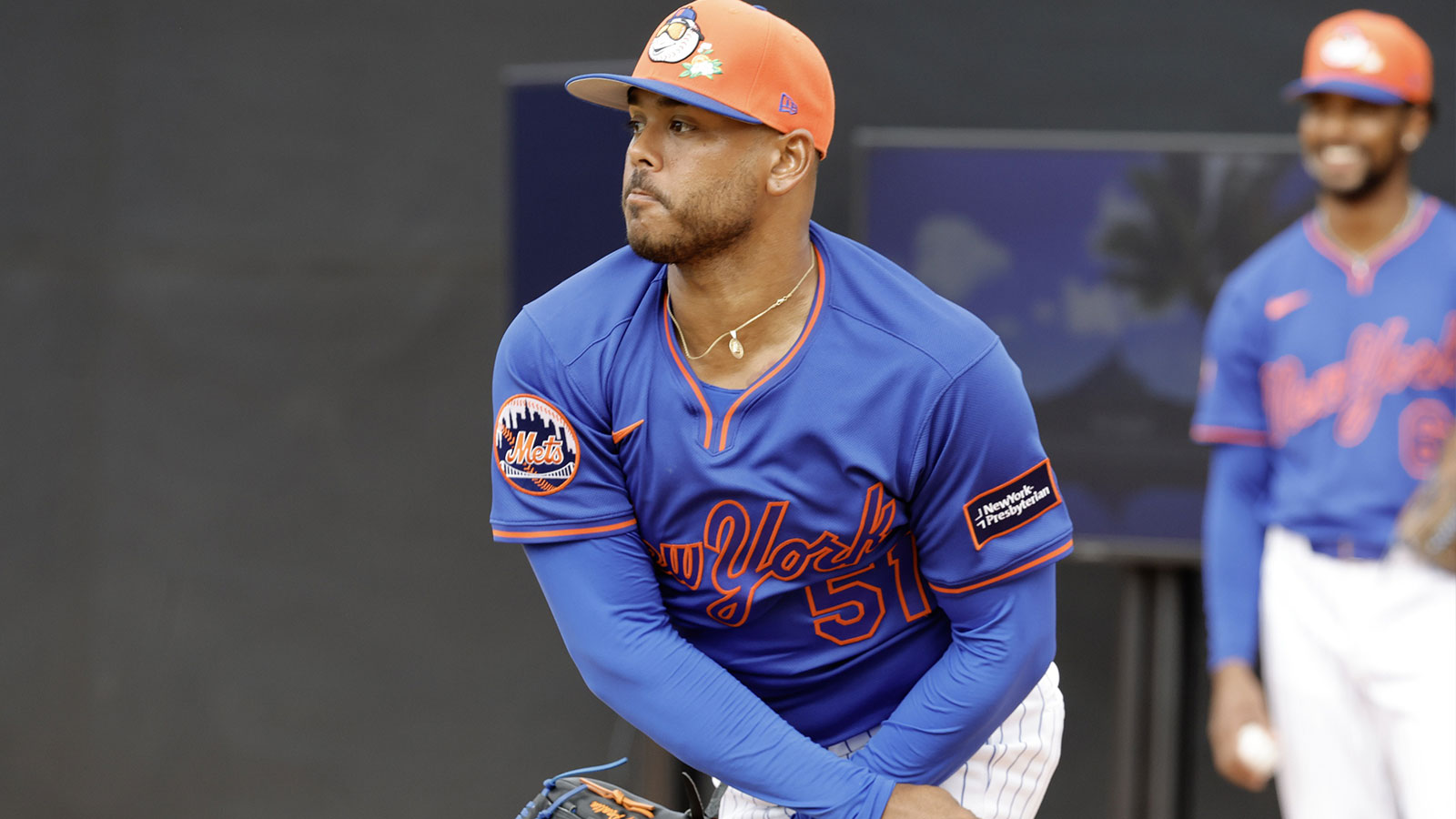  New York Mets pitcher Freddy Peralta (51) throws a pitch during the New York Mets spring training workouts at Clover Park.