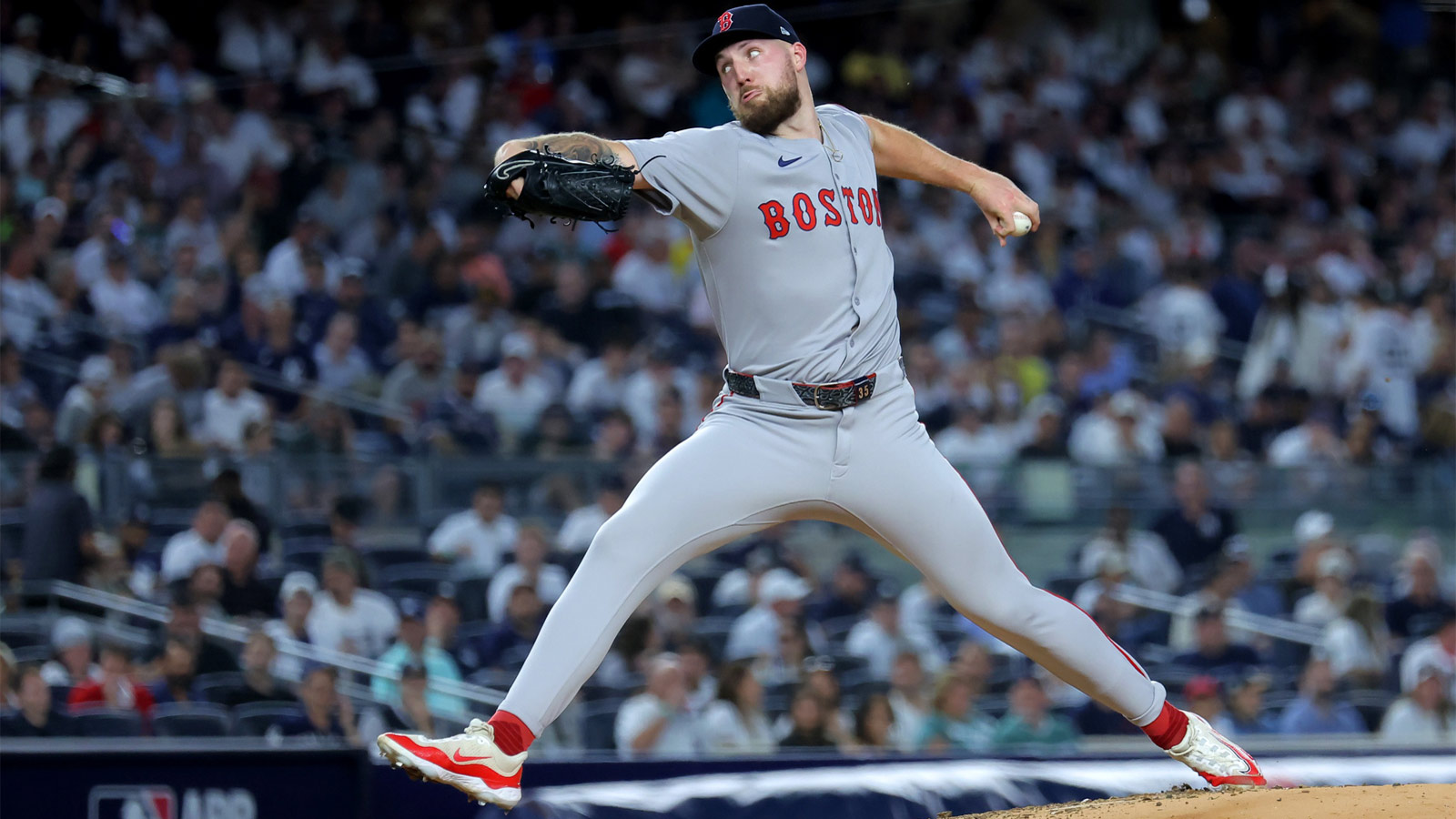 Boston Red Sox starting pitcher Garrett Crochet (35) pitches against the New York Yankees during the third inning of game one of the Wildcard round of the 2025 MLB playoffs at Yankee Stadium. 