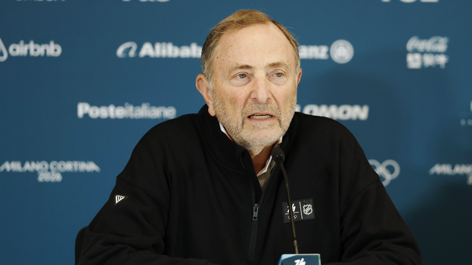 NHL commissioner Gary Bettman at a men's ice hockey press conference during the Milano Cortina 2026 Olympic Winter Games at Milano Santagiulia Ice Hockey Arena.