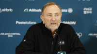 NHL commissioner Gary Bettman at a men's ice hockey press conference during the Milano Cortina 2026 Olympic Winter Games at Milano Santagiulia Ice Hockey Arena.