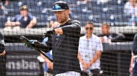 New York Yankees outfielder Giancarlo Stanton (27) prepares for batting practice during spring training at George M. Steinbrenner Field.
