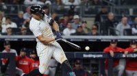 New York Yankees designated hitter Giancarlo Stanton (27) breaks his bat as he grounds out against the Boston Red Sox in the seventh inning during game three of the Wildcard round for the 2025 MLB playoffs at Yankee Stadium.