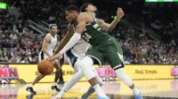 Milwaukee Bucks forward Giannis Antetokounmpo (34) drives to the basket against San Antonio Spurs center Victor Wembanyama (1) during the second half at Frost Bank Center