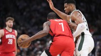 Houston Rockets forward Kevin Durant (7) drives to the basket against Milwaukee Bucks forward Giannis Antetokounmpo (34) in the second half at Fiserv Forum.