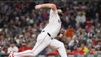 Boston Red Sox starting pitcher Lucas Giolito (54) pitches against the Athletics during the third inning at Fenway Park.