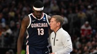 Gonzaga Bulldogs forward Graham Ike (13) talks with head coach Mark Few in the first half against the Purdue Boilermakers during the NCAA Tournament Midwest Regional at Little Caesars Arena.