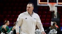 University of Wisconsin-Green Bay men's basketball head coach Doug Gottlieb leaves the court after a game against Wright State