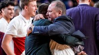 Wisconsin head coach Greg Gard, center right, celebrates 91-88 win over Michigan at Crisler Center in Ann Arbor on Saturday, Jan. 10, 2026.