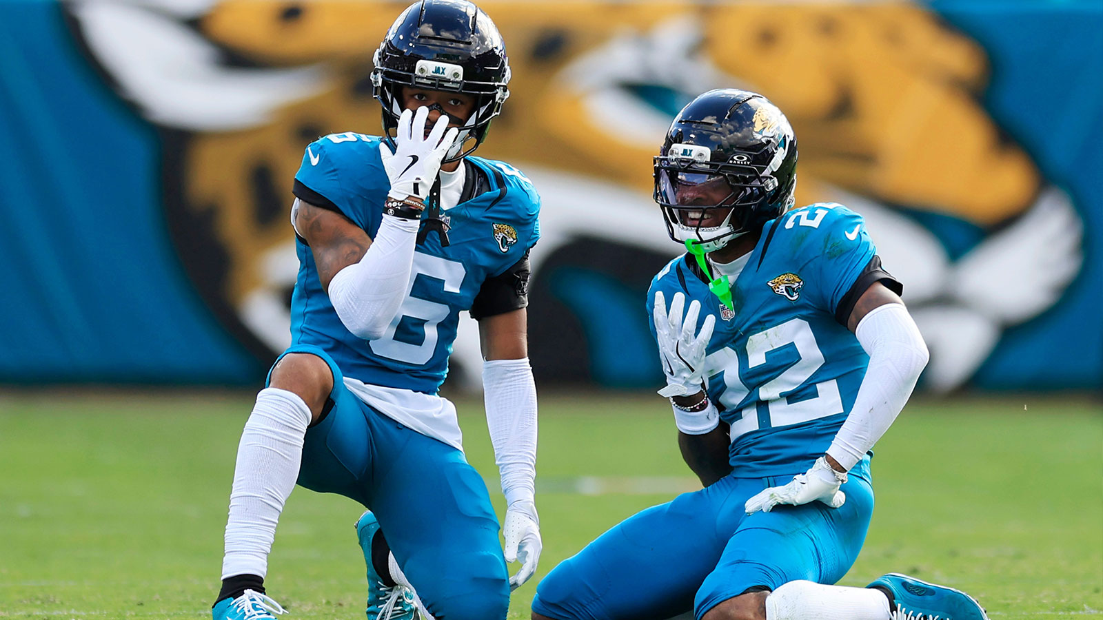 Jacksonville Jaguars cornerback Greg Newsome II (6) and cornerback Jarrian Jones (22) celabrate after Jones broke up a pass during the third quarter of a NFL football matchup at EverBank Stadium, Sunday, Dec. 14, 2025, in Jacksonville, Fla. The Jaguars defeated the Jets 48-20. 