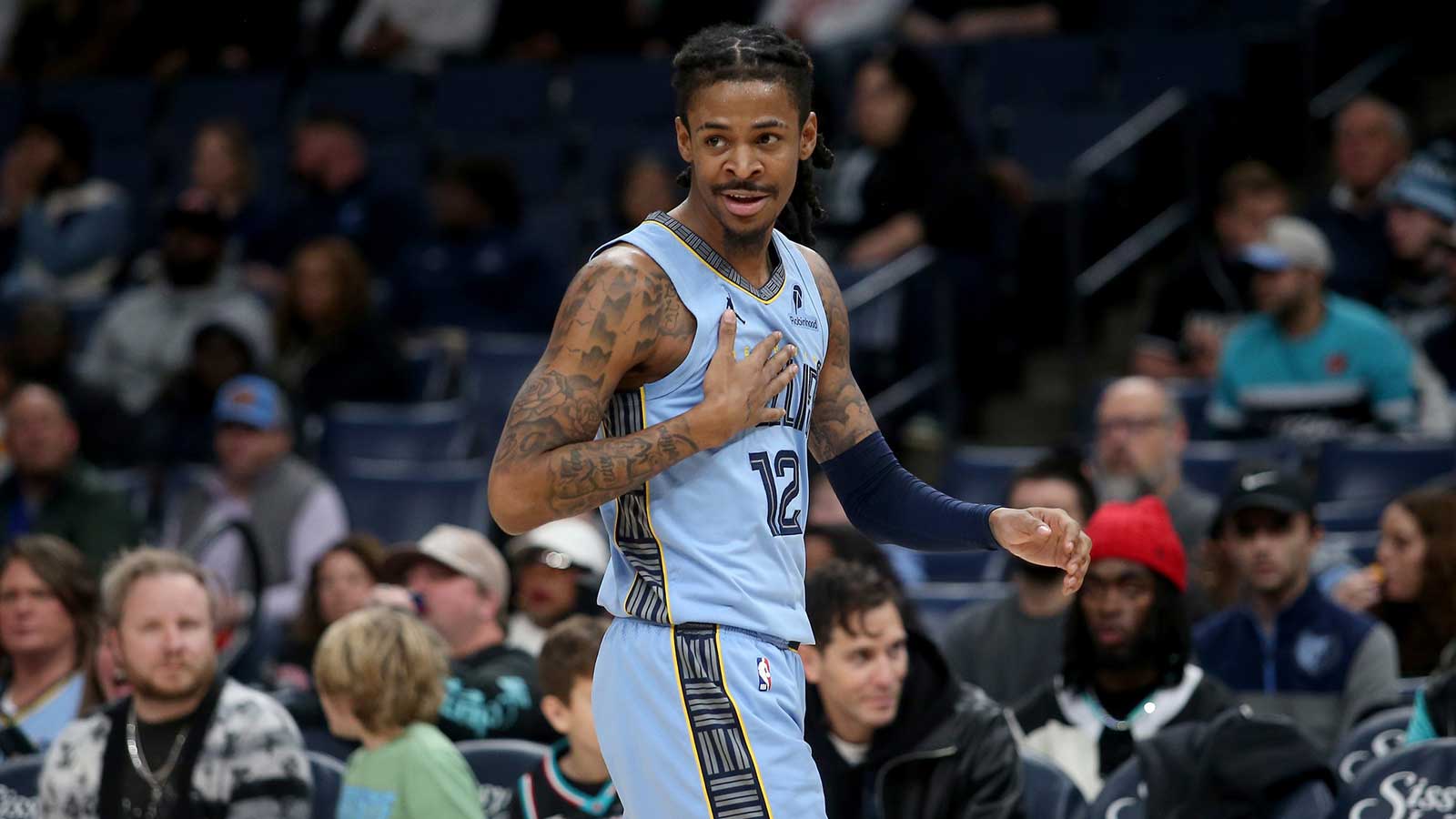 Memphis Grizzlies guard Ja Morant (12) reacts during the first quarter against the Atlanta Hawks at FedExForum. 