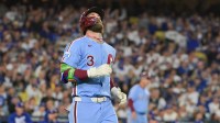 Philadelphia Phillies first baseman Bryce Harper (3) reacts after lining out during the seventh inning against the Los Angeles Dodgers during game three of the NLDS round for the 2025 MLB playoffs at Dodger Stadium.