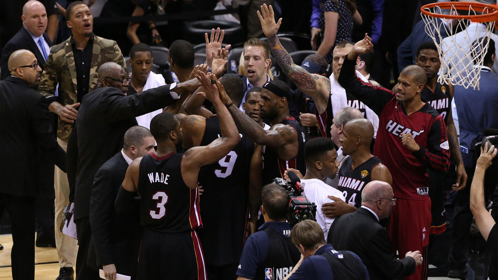 Heat forward LeBron James (6) and teammates celebrate a victory against the San Antonio Spurs in game two of the 2014 NBA Finals at AT&T Center. The Heat beat the Spurs 98-96