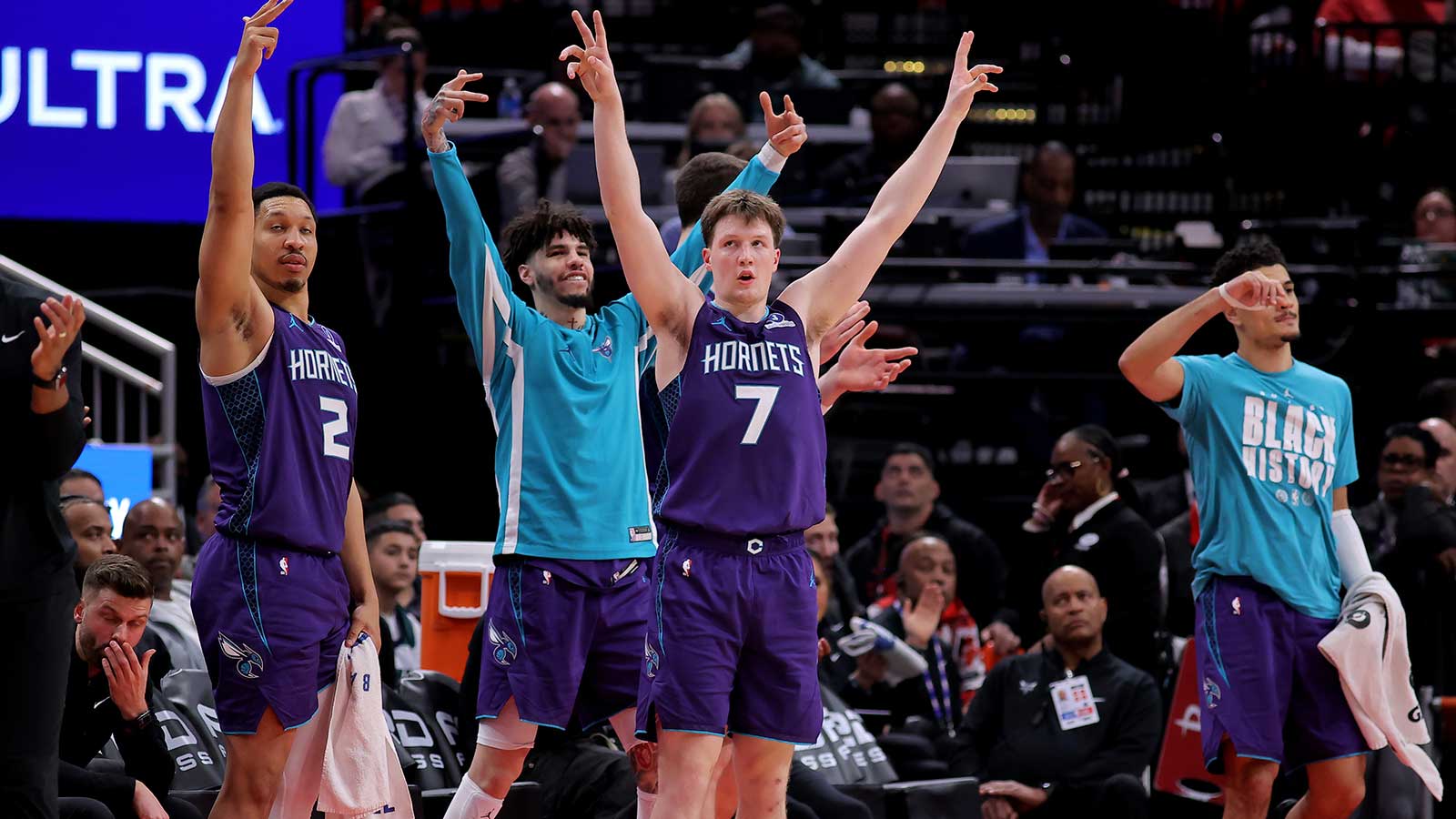 Charlotte Hornets players react after a basket against the Houston Rockets during the fourth quarter at Toyota Center. 