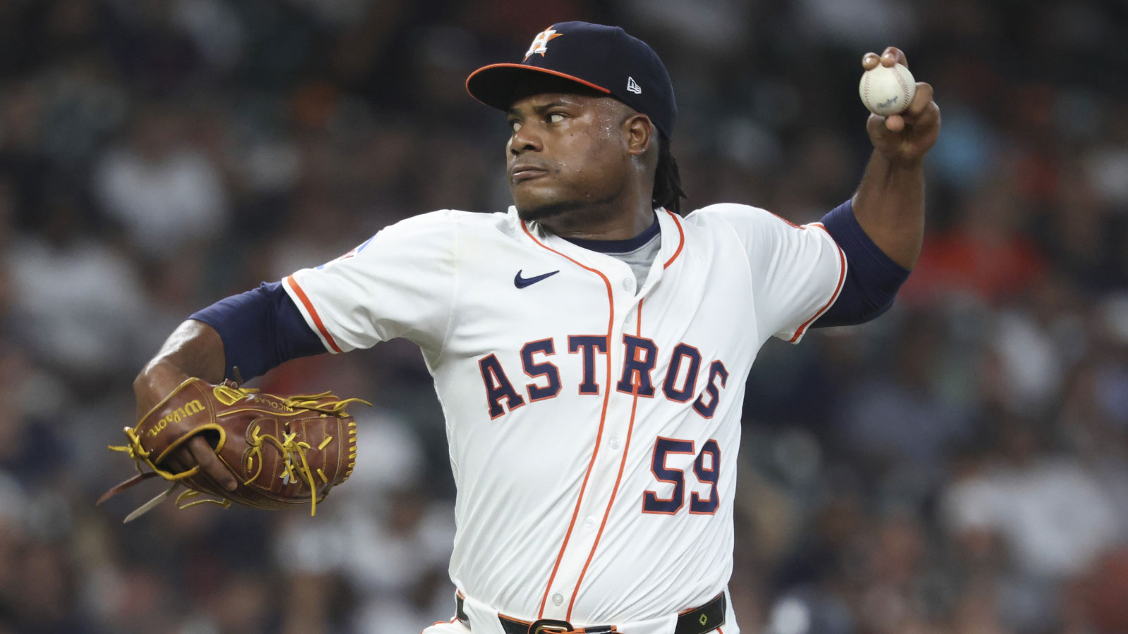 Houston Astros starting pitcher Framber Valdez (59) delivers a pitch during the first inning against the New York Yankees at Daikin Park. Mandatory Credit: Troy Taormina-Imagn Images